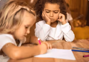Children studying with pens and paper, focusing on learning and education.